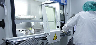 Person in hospital testing lab